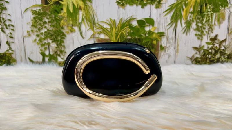 Metal handed party clutch